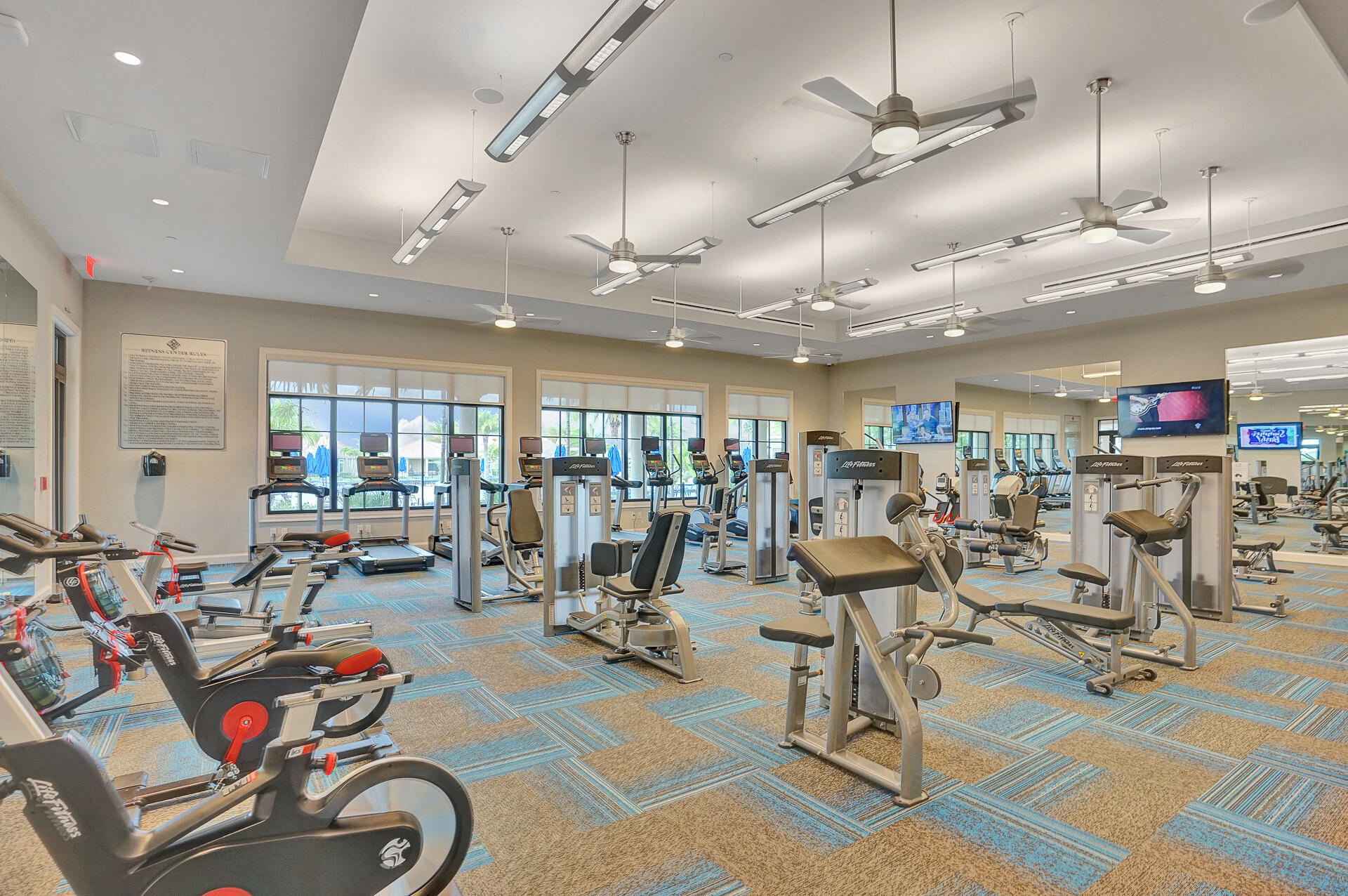 11792 Leon Circle Parkland, FL 33076 - Photo 45 of 51 a view of a room with gym equipment