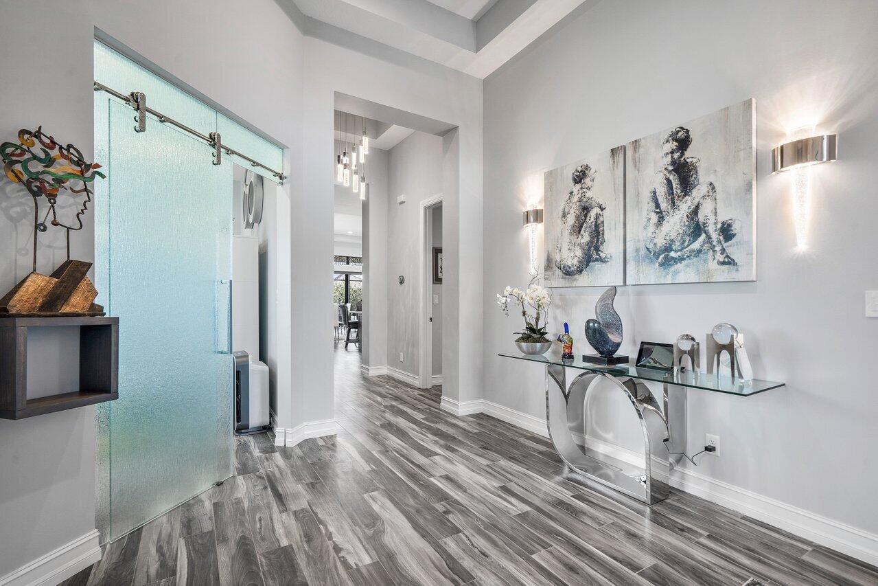 11792 Leon Circle Parkland, FL 33076 - Photo 5 of 51 a view of a room with shelves