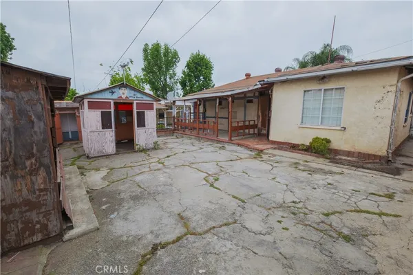 a house with white door of the back yard
