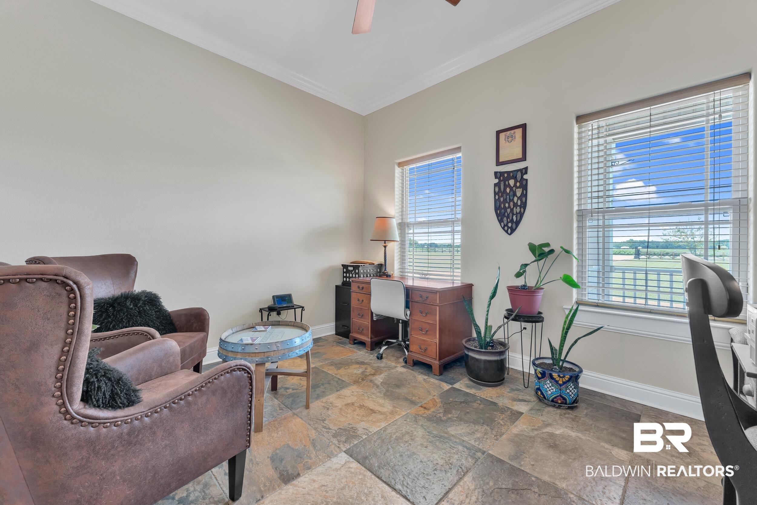 28918 Comstock Road Elberta, AL 36530 - Photo 23 of 53 Office featuring ornamental molding, ceiling fan, and stone finish floors