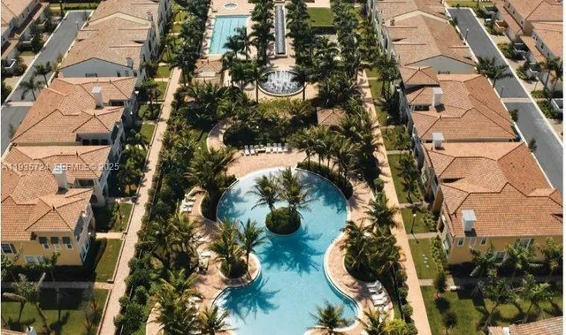 an aerial view of multi story residential apartment building
