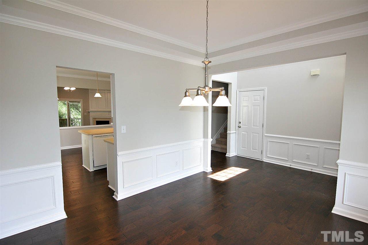 3401 Parlor Street Raleigh, NC 27614 - Photo 5 of 25 a view of a room with wooden floor and a ceiling fan