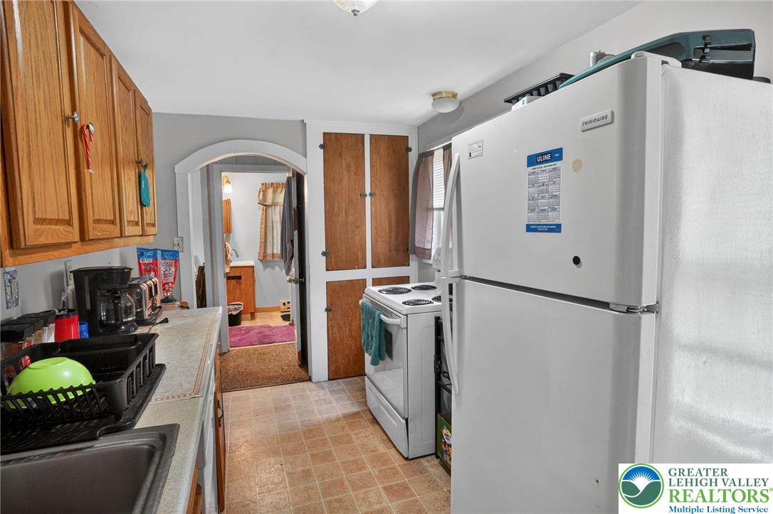 357 Main Road Lehighton, PA 18235 - Photo 32 of 38 a kitchen with stainless steel appliances granite countertop a refrigerator and a stove