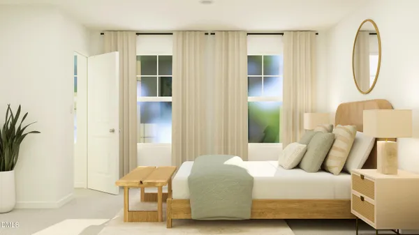 a bedroom with a bed and a mirror