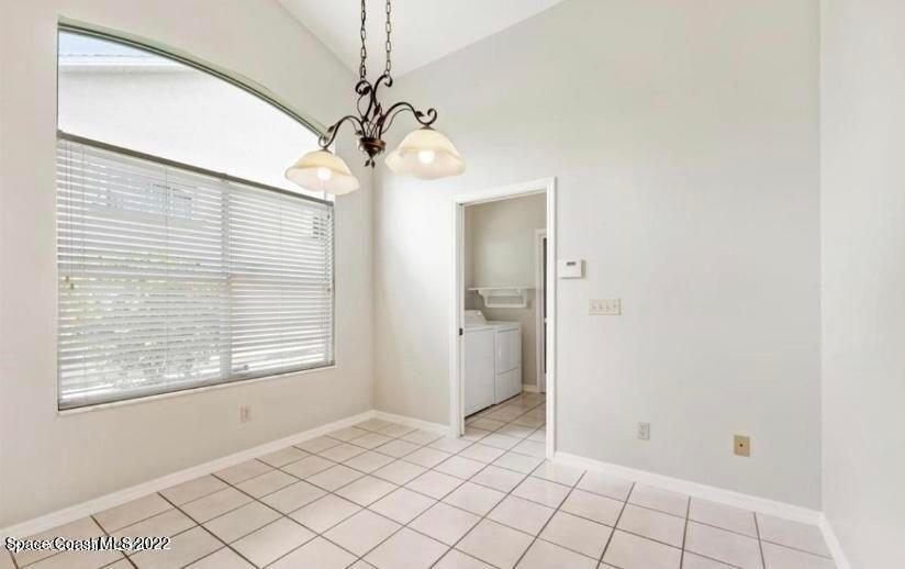 468 Prestwick Court Melbourne, FL 32940 - Photo 13 of 13 a view of an empty room with a window