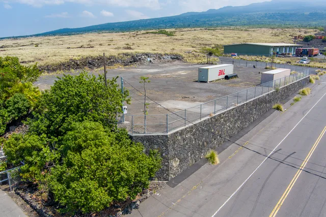 a view of a city with an ocean view