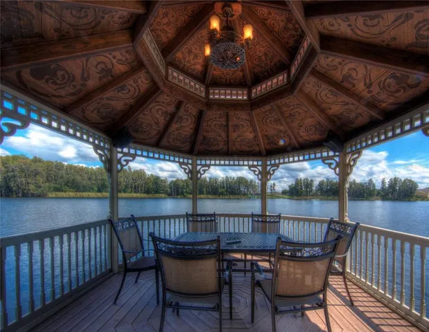 a view of a street with palm trees