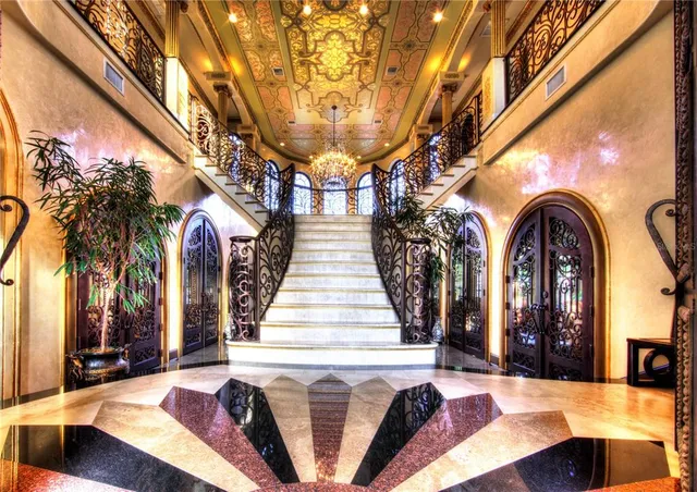 a front view of a house with large windows