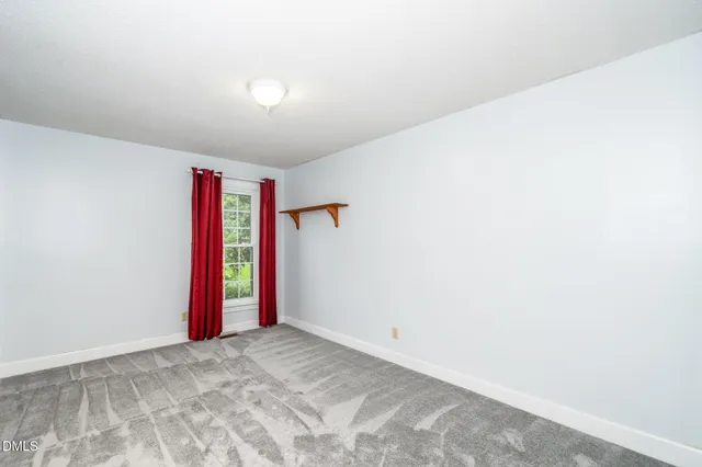 a bathroom with a toilet sink vanity tub and shower