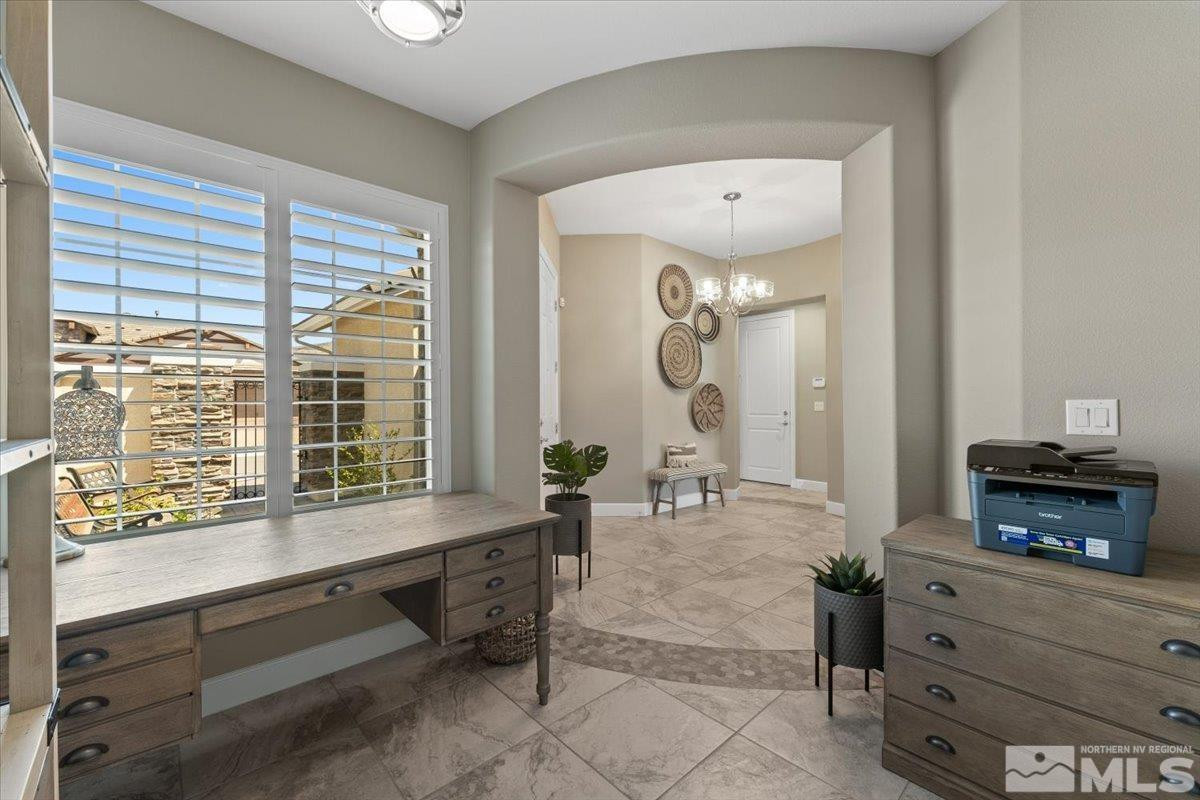 9543 Tencendur Lane Reno, NV 89521 - Photo 8 of 40 a living room with furniture and large windows