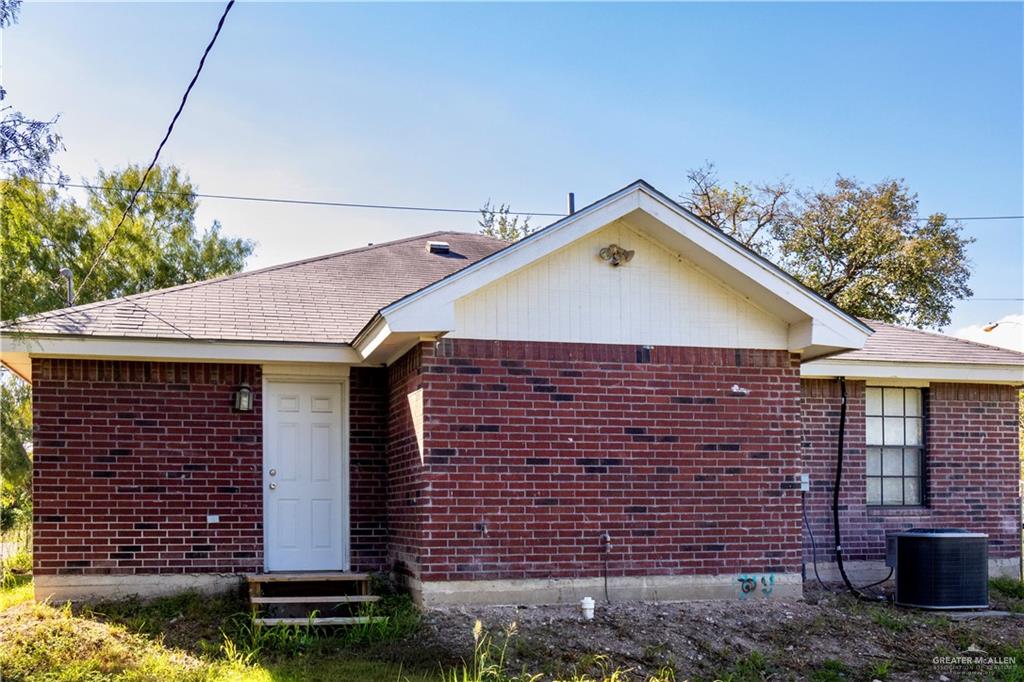 3301 South McColl Road McAllen, TX 78503 - Photo 28 of 28 a front view of a house with a yard