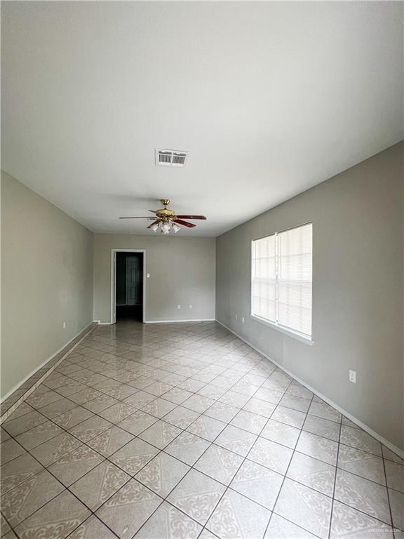 3301 South McColl Road McAllen, TX 78503 - Photo 3 of 28 a view of an empty room with a window