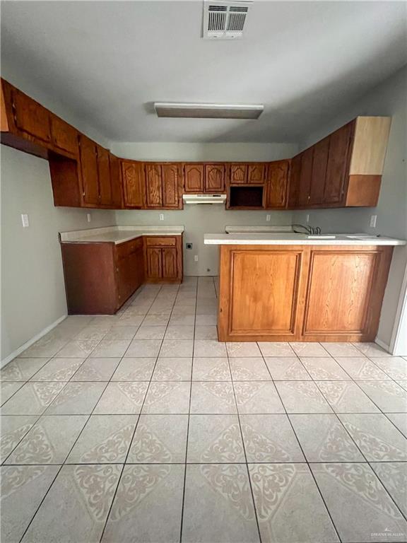 3301 South McColl Road McAllen, TX 78503 - Photo 5 of 28 a view of kitchen with cabinets