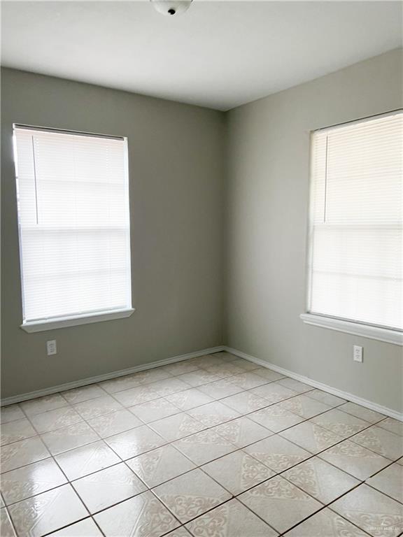 3301 South McColl Road McAllen, TX 78503 - Photo 9 of 28 a view of an empty room with a window