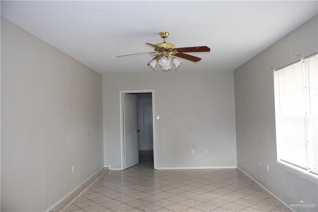 3301 South McColl Road McAllen, TX 78503 - Photo 10 of 28 a view of an empty room with a window