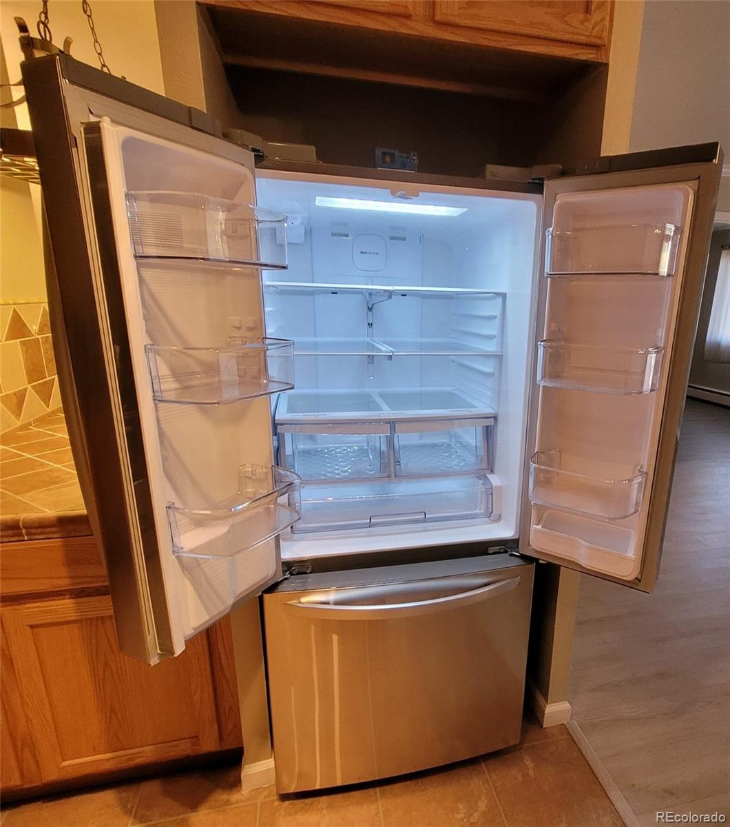 755 South Clinton Street, Unit 6B Denver, CO 80247 - Photo 13 of 48 a close up of a fireplace