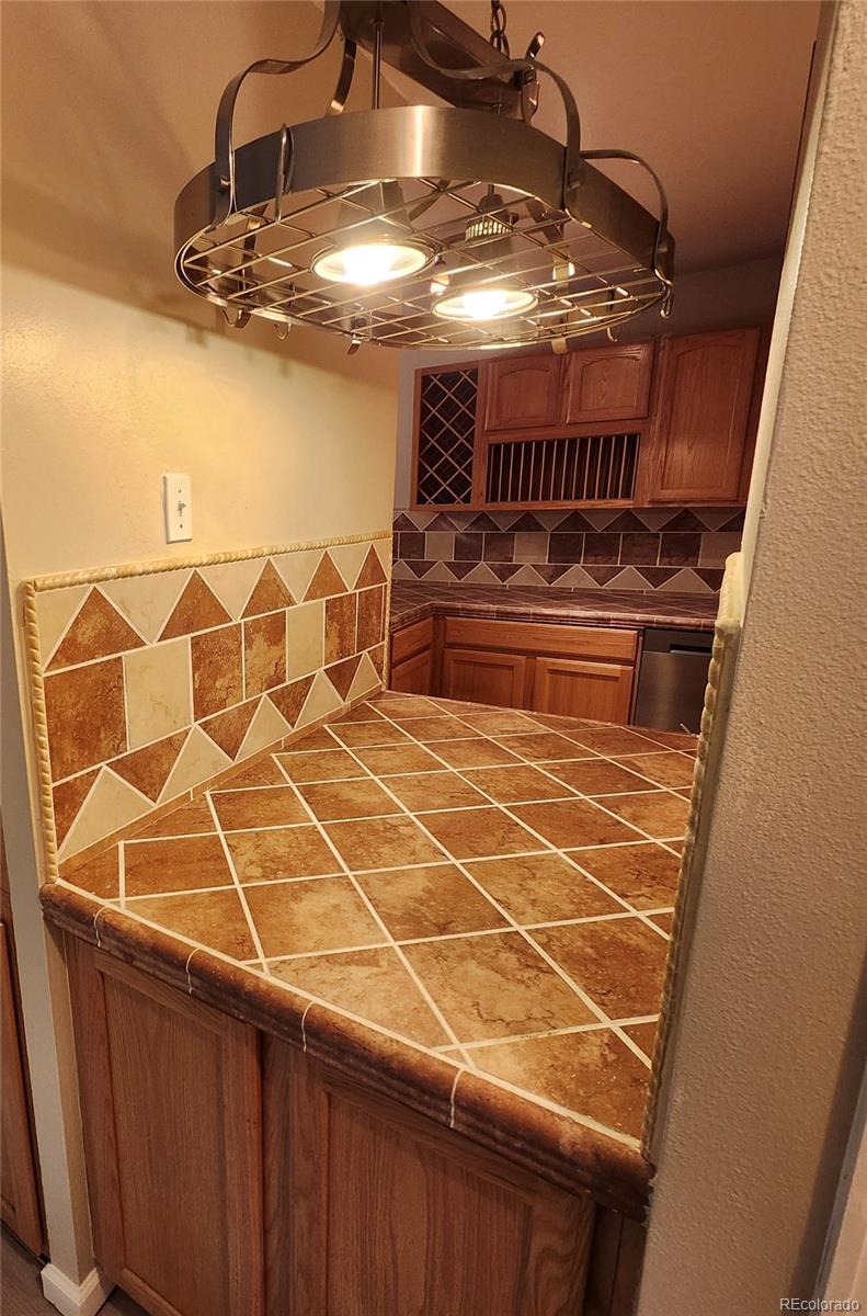 755 South Clinton Street, Unit 6B Denver, CO 80247 - Photo 3 of 48 a view of water heater room