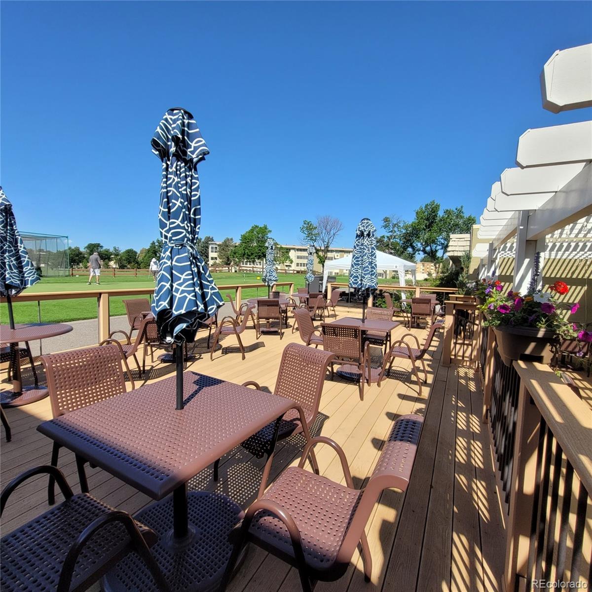 755 South Clinton Street, Unit 6B Denver, CO 80247 - Photo 40 of 48 a view of a terrace with furniture and garden
