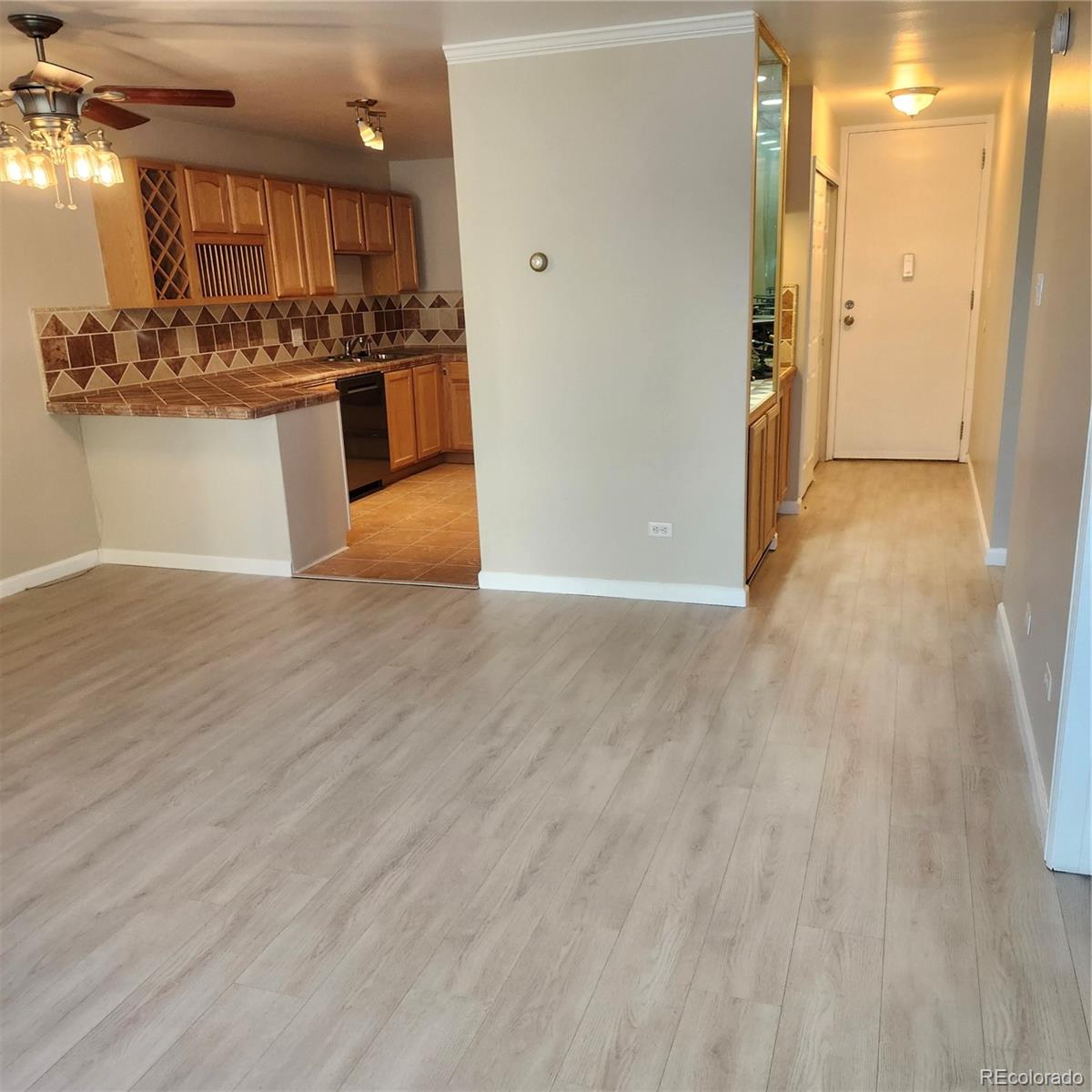 755 South Clinton Street, Unit 6B Denver, CO 80247 - Photo 7 of 48 a view of a kitchen with a sink