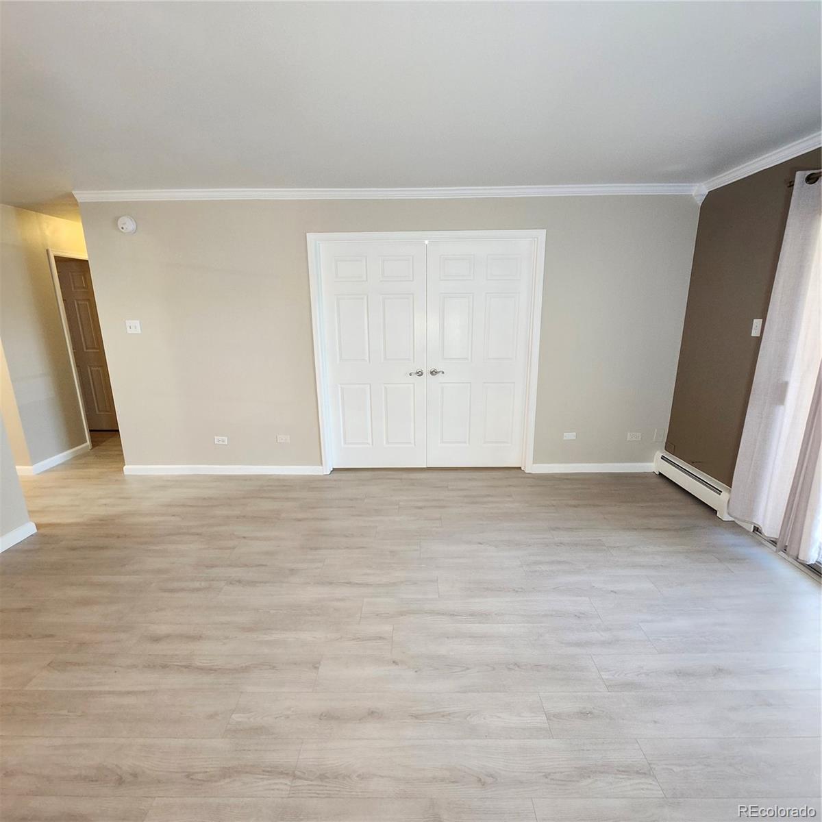 755 South Clinton Street, Unit 6B Denver, CO 80247 - Photo 8 of 48 a view of an empty room