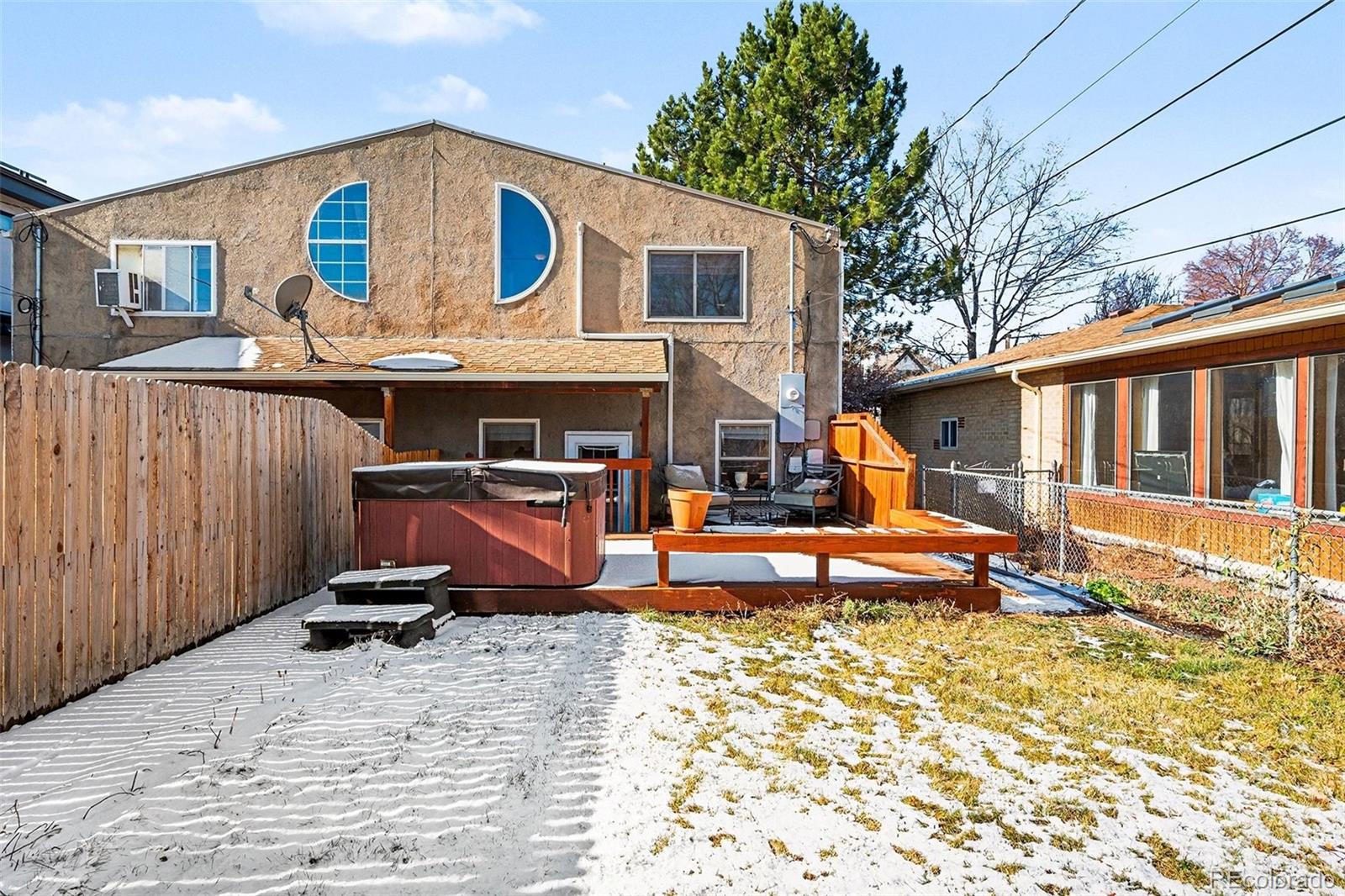 2222 Meade Street Denver, CO 80211 - Photo 17 of 19 a front view of a house with a yard