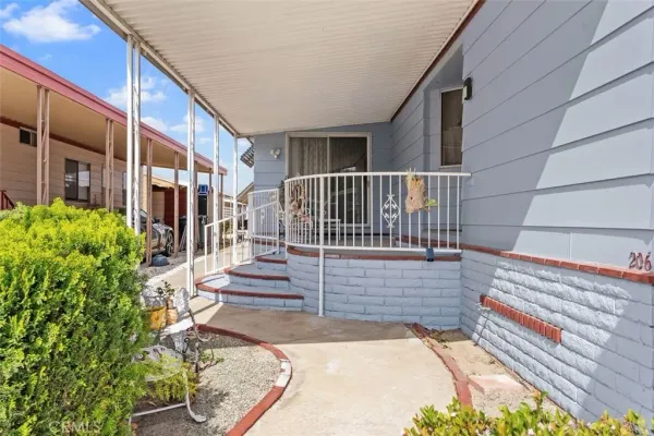 a balcony with chairs