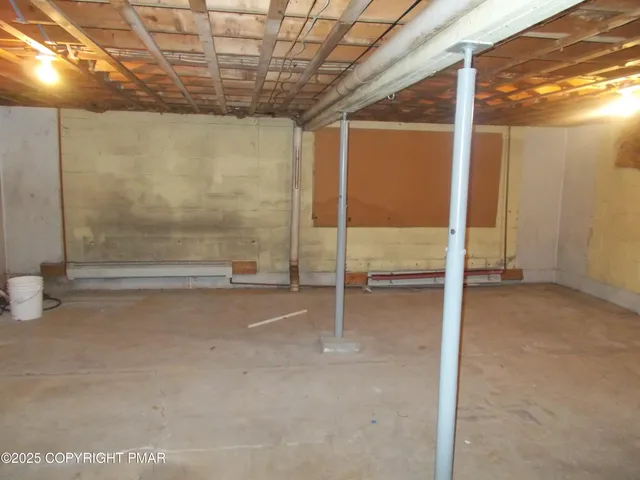 a view of an empty room with a glass door