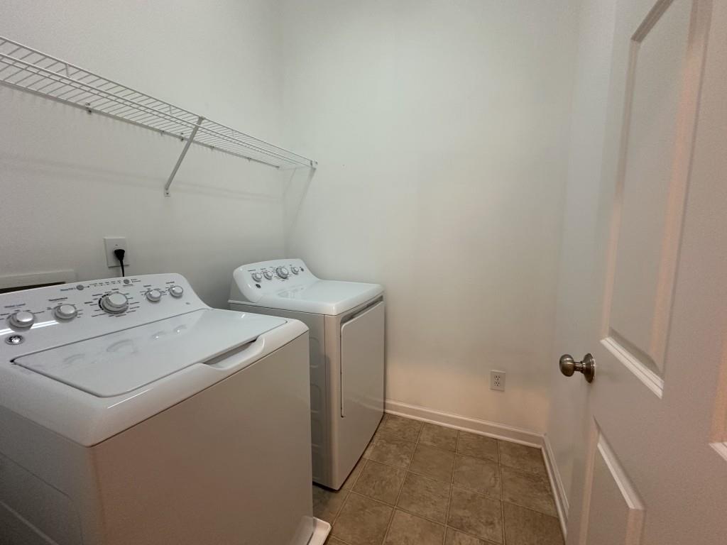 11191 Calypso Drive Alpharetta, GA 30009 - Photo 30 of 37 a utility room with dryer and washer