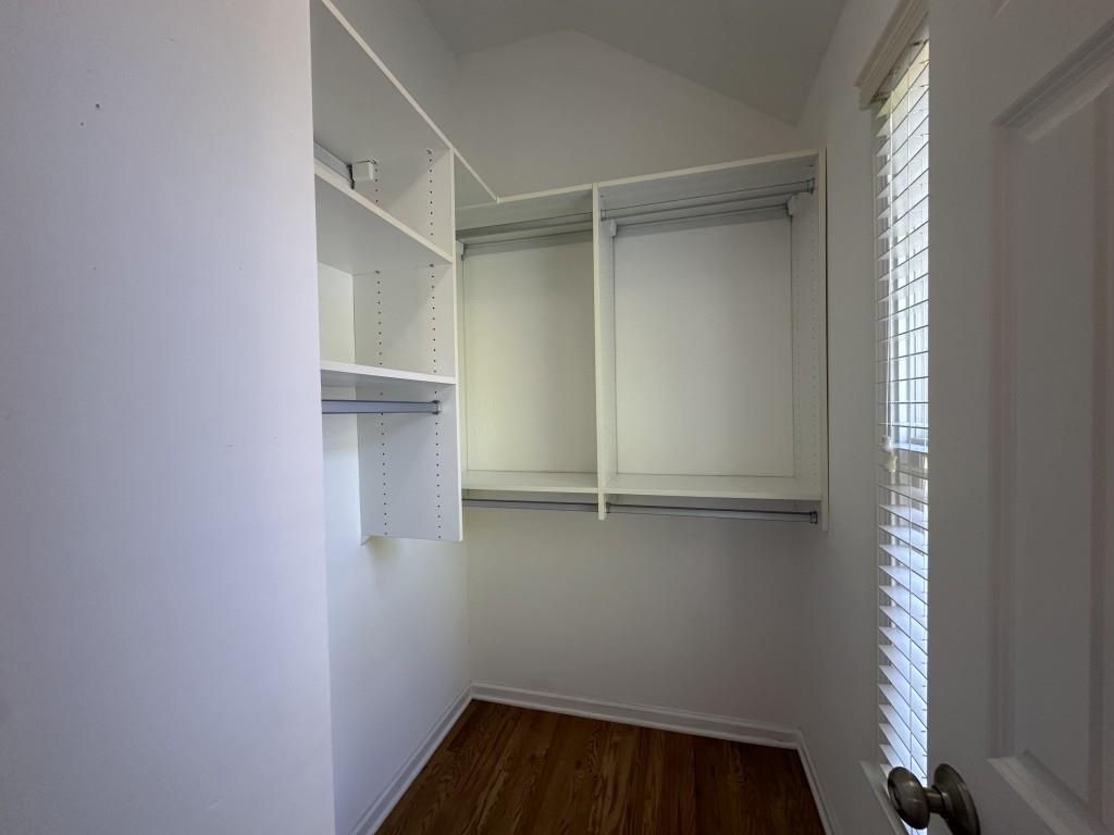 11191 Calypso Drive Alpharetta, GA 30009 - Photo 34 of 37 a view of walk in closet with empty racks