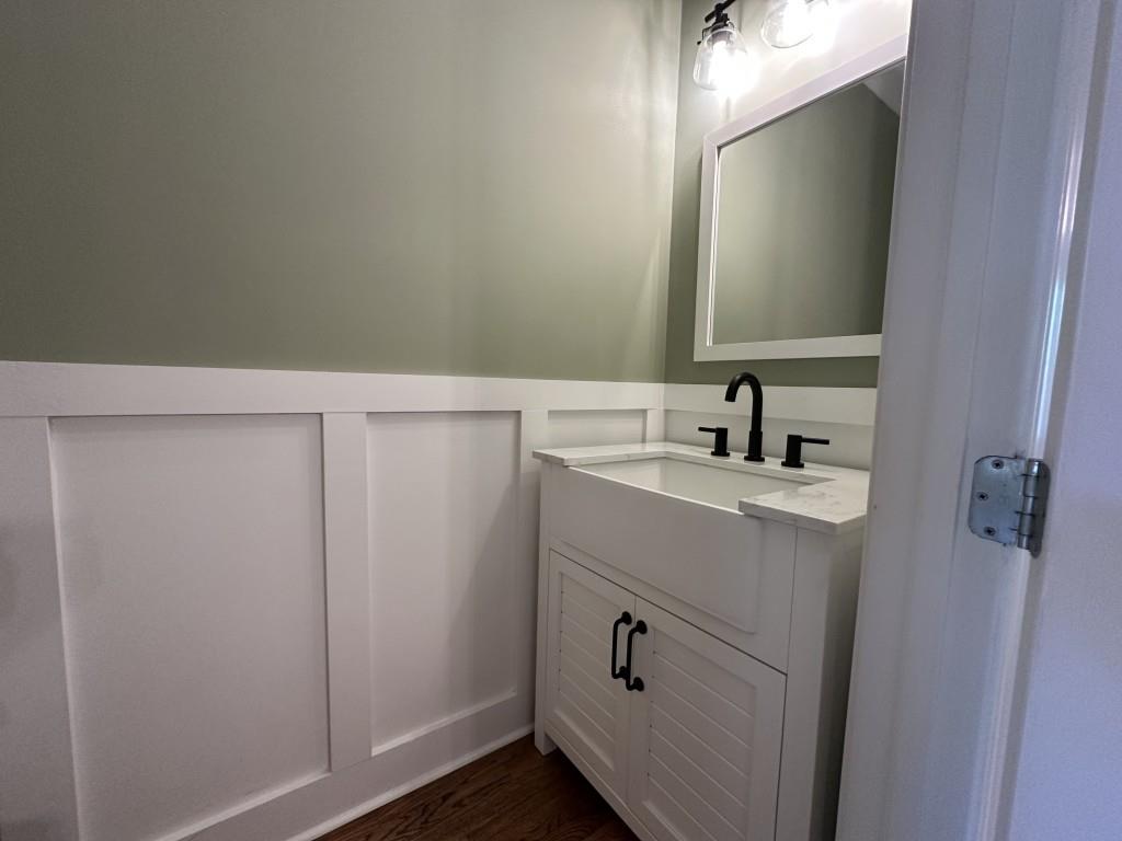 11191 Calypso Drive Alpharetta, GA 30009 - Photo 10 of 37 a bathroom with a sink and a mirror