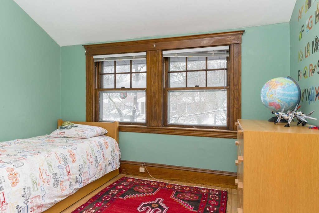 3 Addington Road, Unit 2 Brookline, MA 02445 - Photo 13 of 27 a bedroom with a bed and windows