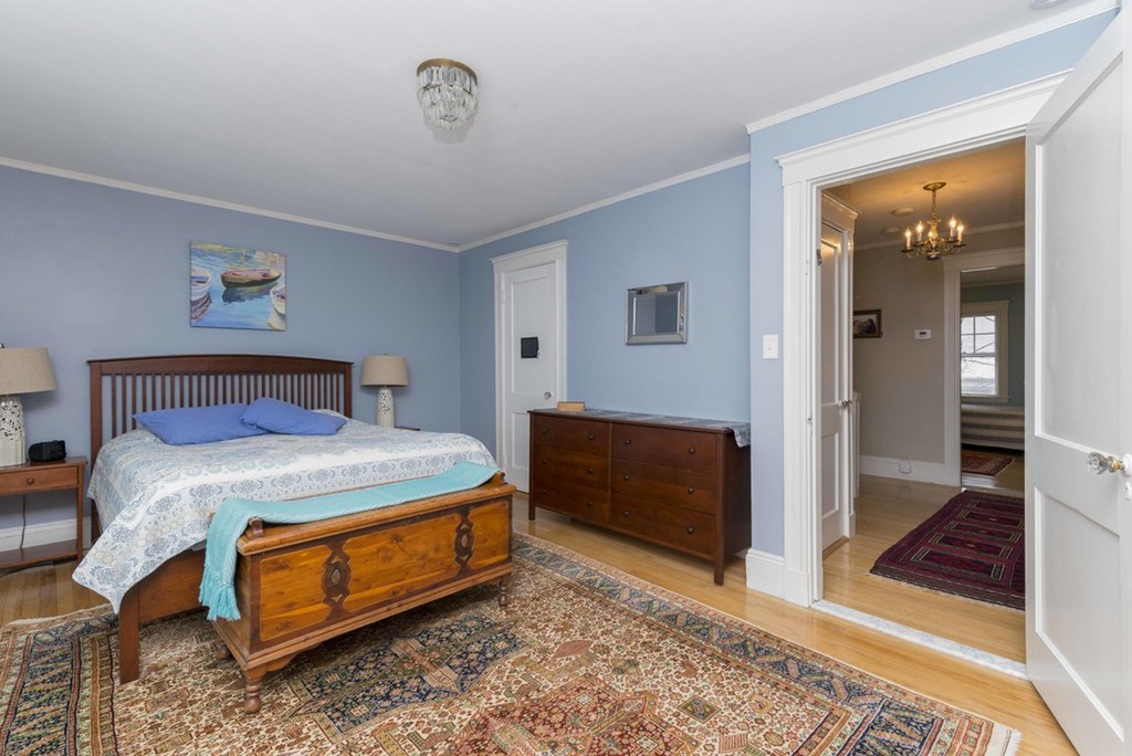 3 Addington Road, Unit 2 Brookline, MA 02445 - Photo 17 of 27 a bedroom with a bed and a view of bathroom