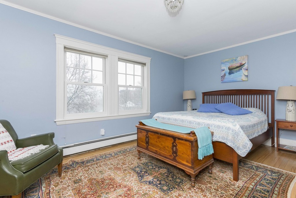 3 Addington Road, Unit 2 Brookline, MA 02445 - Photo 18 of 27 a bedroom with a bed and a window