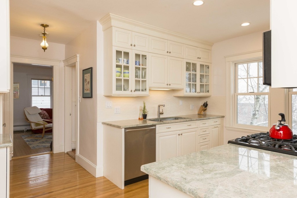 3 Addington Road, Unit 2 Brookline, MA 02445 - Photo 2 of 27 a kitchen with a sink cabinets and window