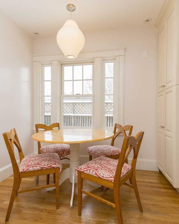 3 Addington Road, Unit 2 Brookline, MA 02445 - Photo 3 of 27 a dining room with furniture and wooden floor