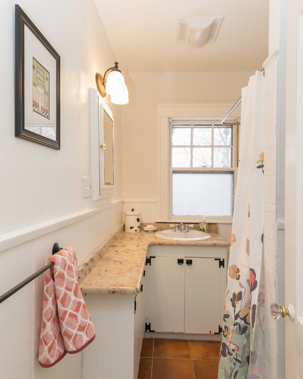 3 Addington Road, Unit 2 Brookline, MA 02445 - Photo 5 of 27 a bathroom with a sink and a mirror