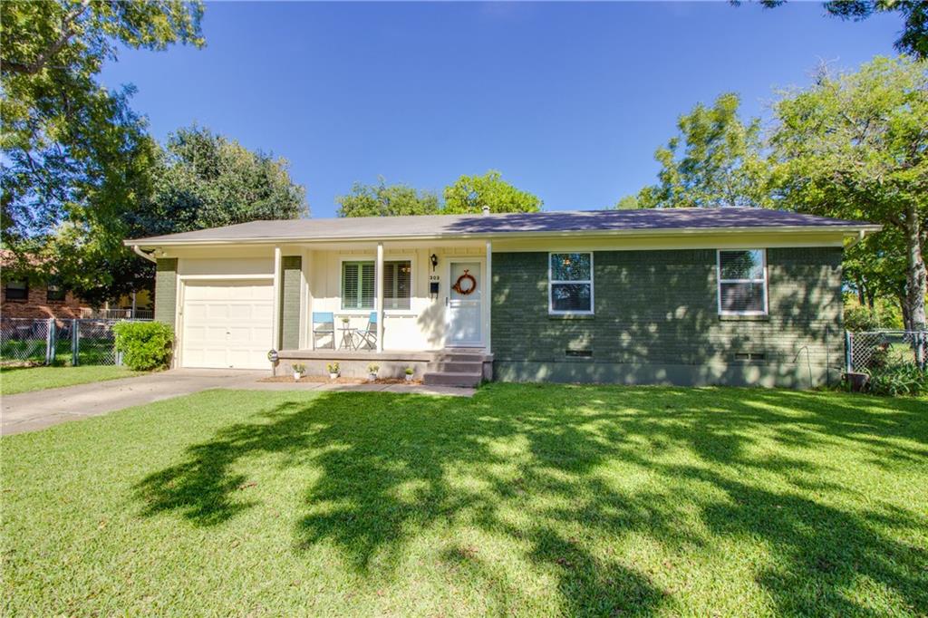 303 Cumberland Road Waxahachie, TX 75165 - Photo 1 of 1 a front view of house with yard and green space