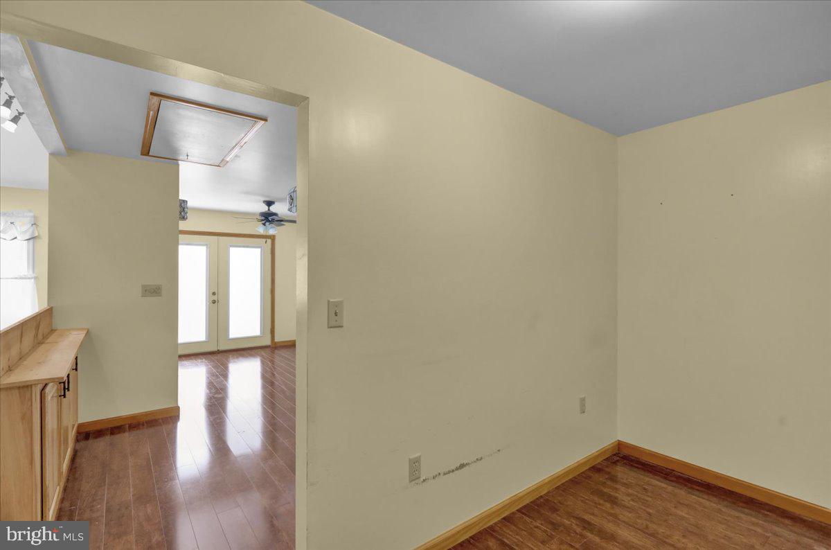 4496 Pheasant Run Reading, PA 19606 - Photo 13 of 37 a view of empty room with wooden floor