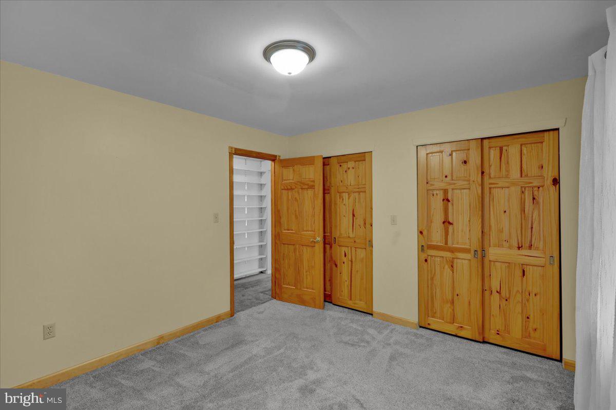 4496 Pheasant Run Reading, PA 19606 - Photo 18 of 37 an empty room with a door