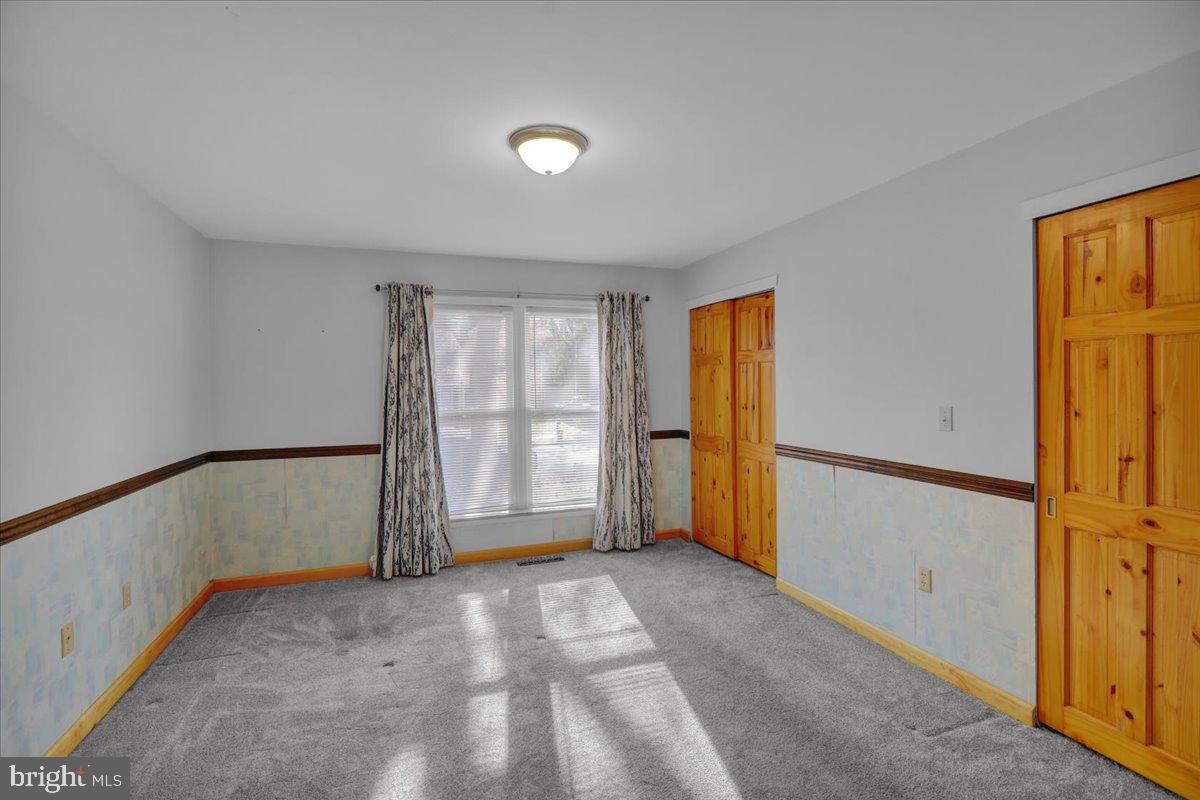 4496 Pheasant Run Reading, PA 19606 - Photo 19 of 37 a view of an empty room with a window