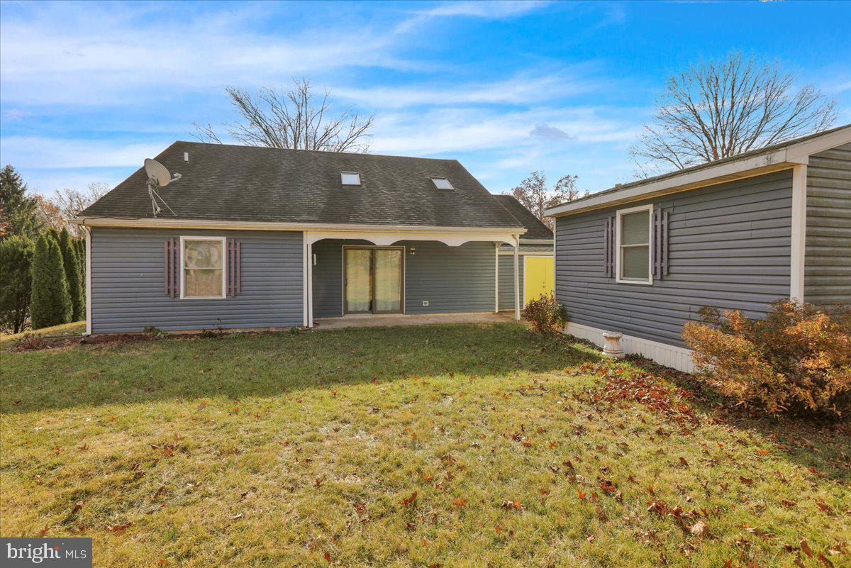 4496 Pheasant Run Reading, PA 19606 - Photo 27 of 37 a front view of a house with garden