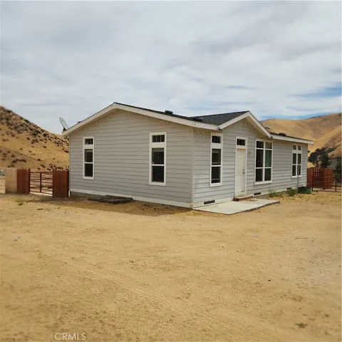 a view of a house with entertaining space
