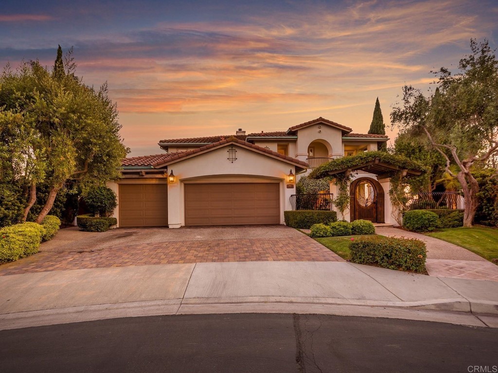 602 West Bluff Court Encinitas, CA 92024 - Photo 12 of 69 a front view of a house with a yard and garage