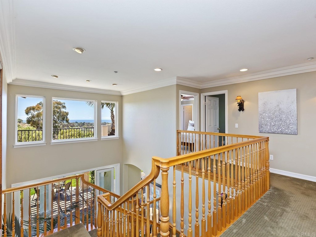 602 West Bluff Court Encinitas, CA 92024 - Photo 33 of 69 a view of an entryway wooden floor and windows