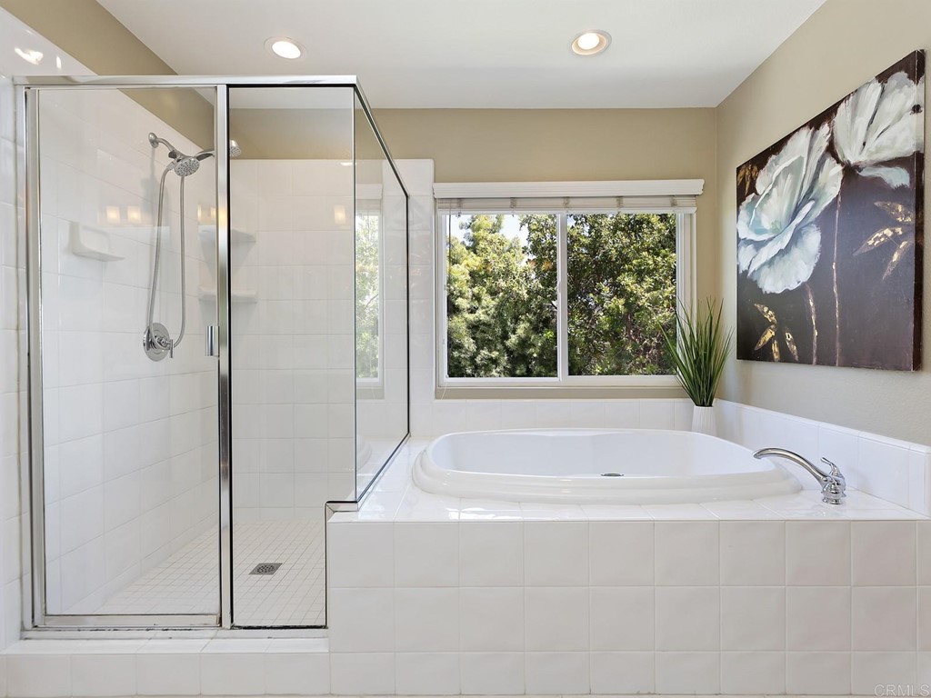 602 West Bluff Court Encinitas, CA 92024 - Photo 39 of 69 a bathroom with a bathtub and a shower