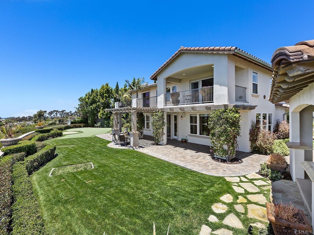 602 West Bluff Court Encinitas, CA 92024 - Photo 50 of 69 a view of a house with a yard