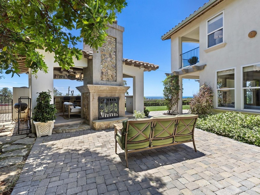 602 West Bluff Court Encinitas, CA 92024 - Photo 61 of 69 a living room with furniture and a fireplace
