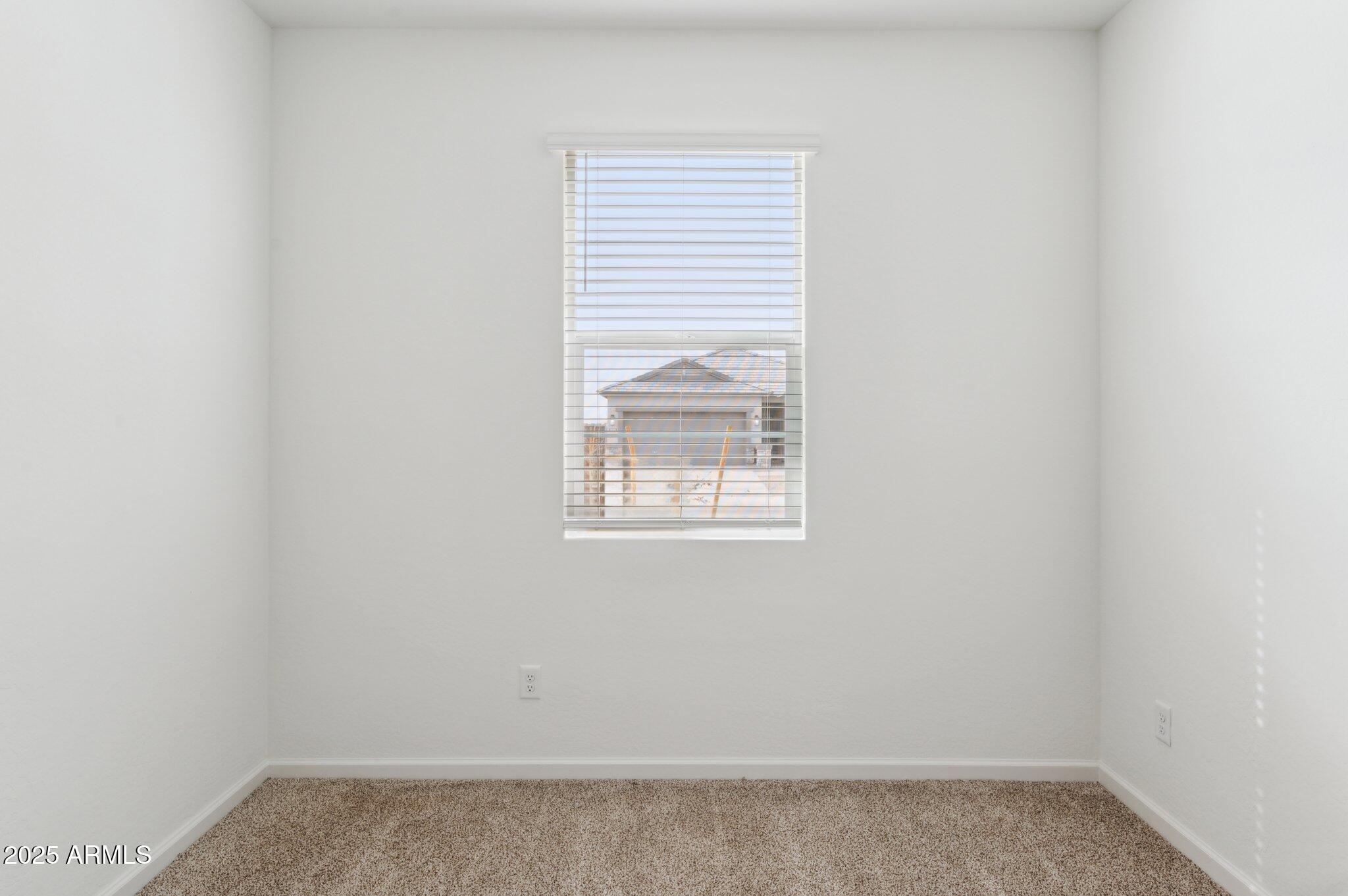 25464 West Fraktur Road Buckeye, AZ 85326 - Photo 15 of 19 a small space with a window