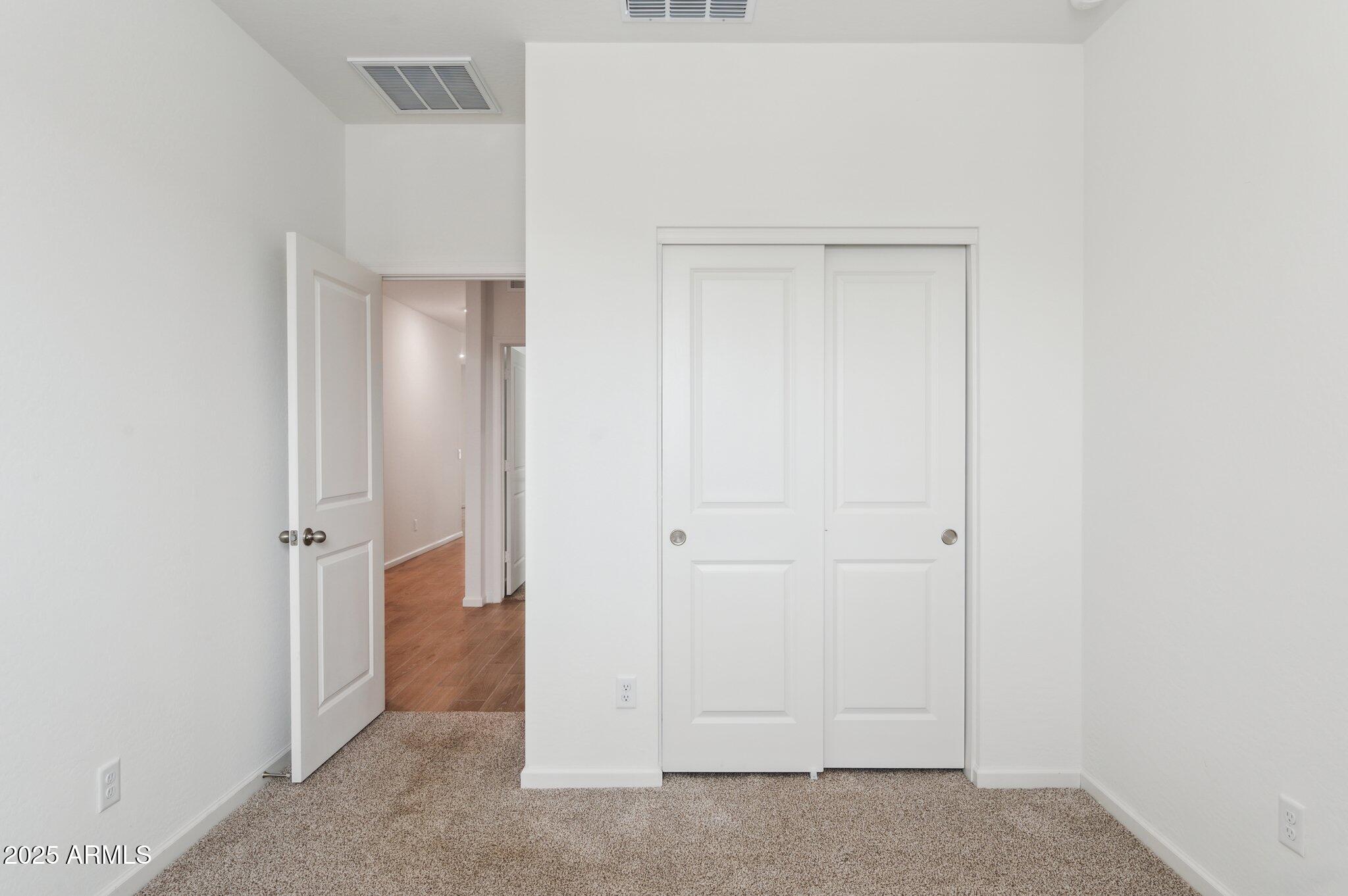 25464 West Fraktur Road Buckeye, AZ 85326 - Photo 16 of 19 a view of an empty room