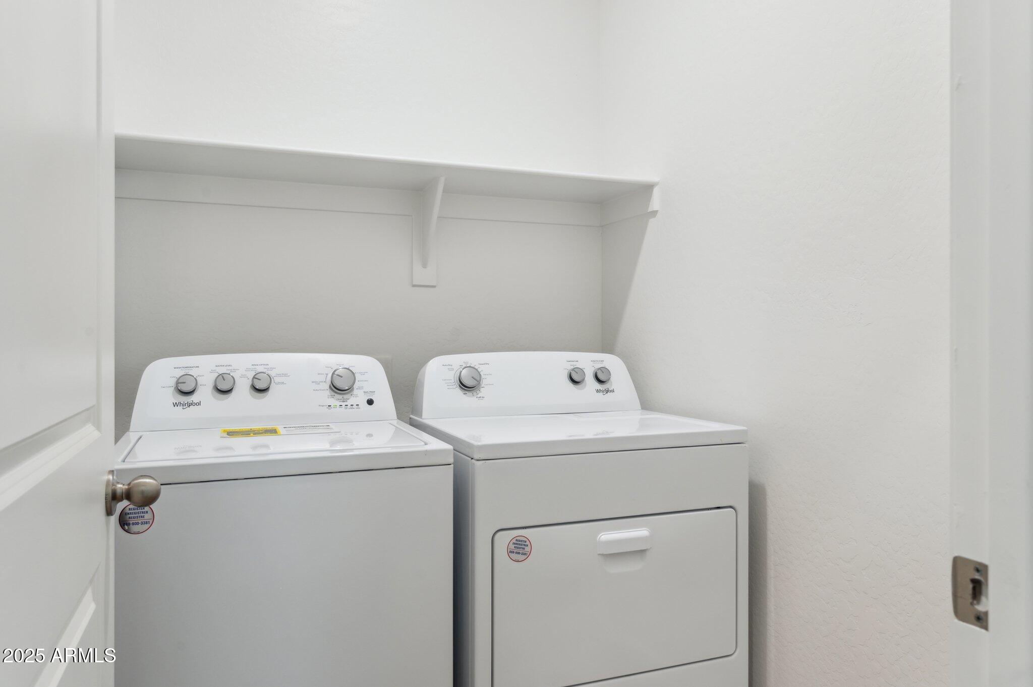 25464 West Fraktur Road Buckeye, AZ 85326 - Photo 17 of 19 a utility room with dryer and washer